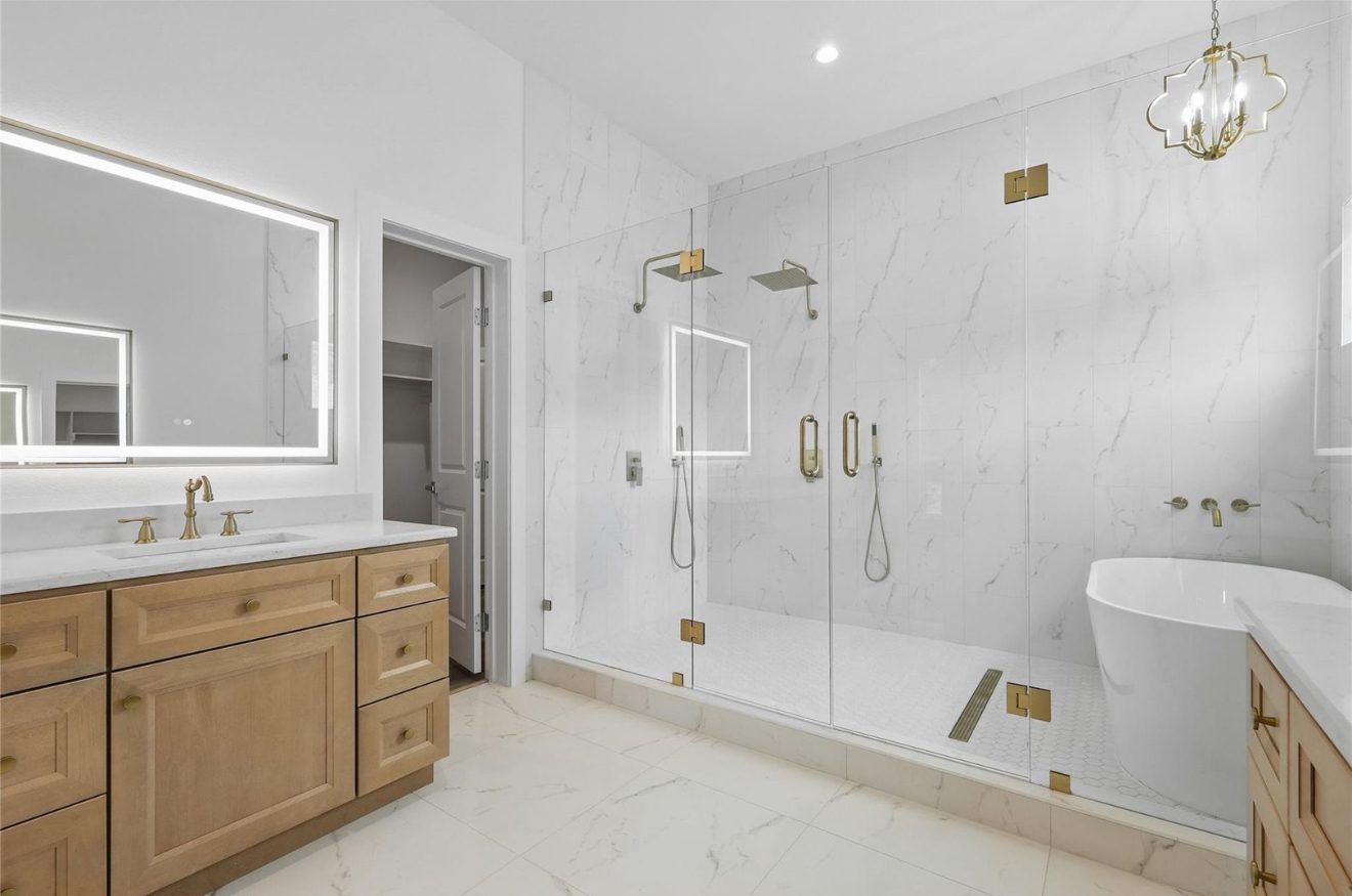 Marble wet room from the vanity side