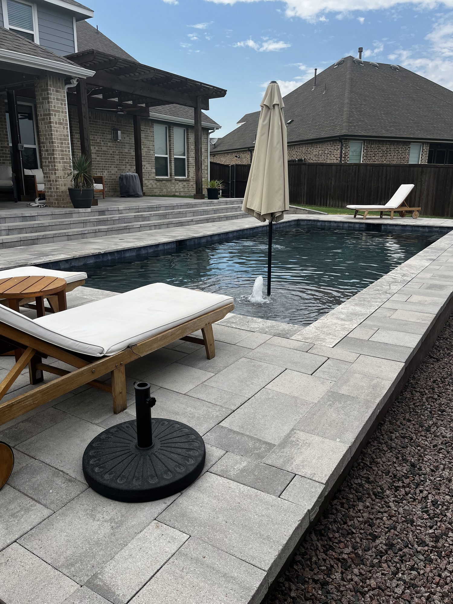 Cedar pergola over the pool patio